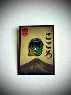 Kappa enamel pin on a cream Kokoro backing card with a hanko stamp