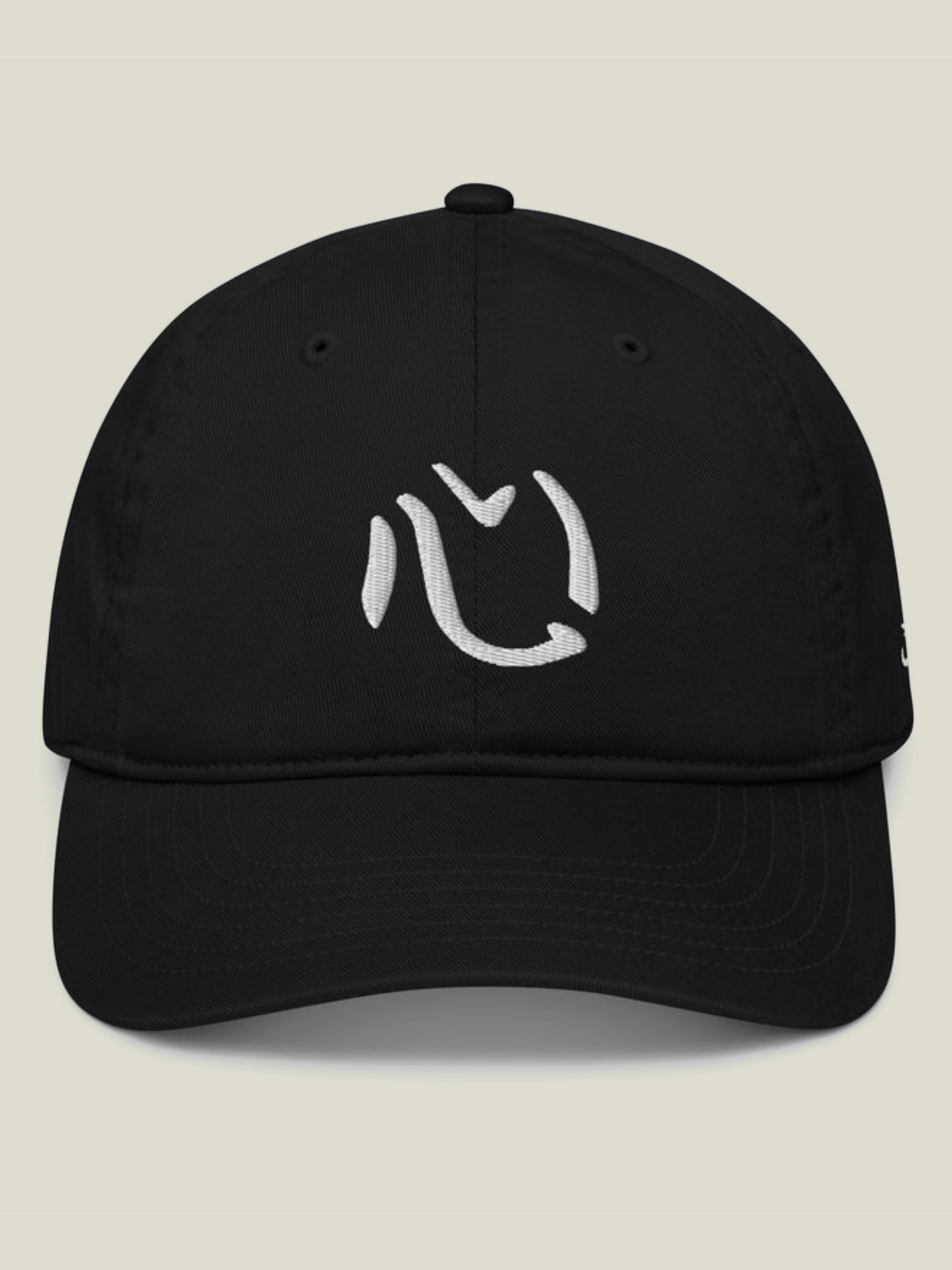 Black hat with white embroidered Kokoro kanji on the front